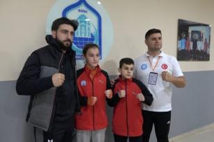 BURSALI İKİZ KARDEŞLER WUSHU’DA DÜNYA BİRİNCİSİ OLDU